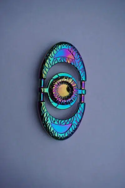 Fidgtet spinner oval i regnbuefarver